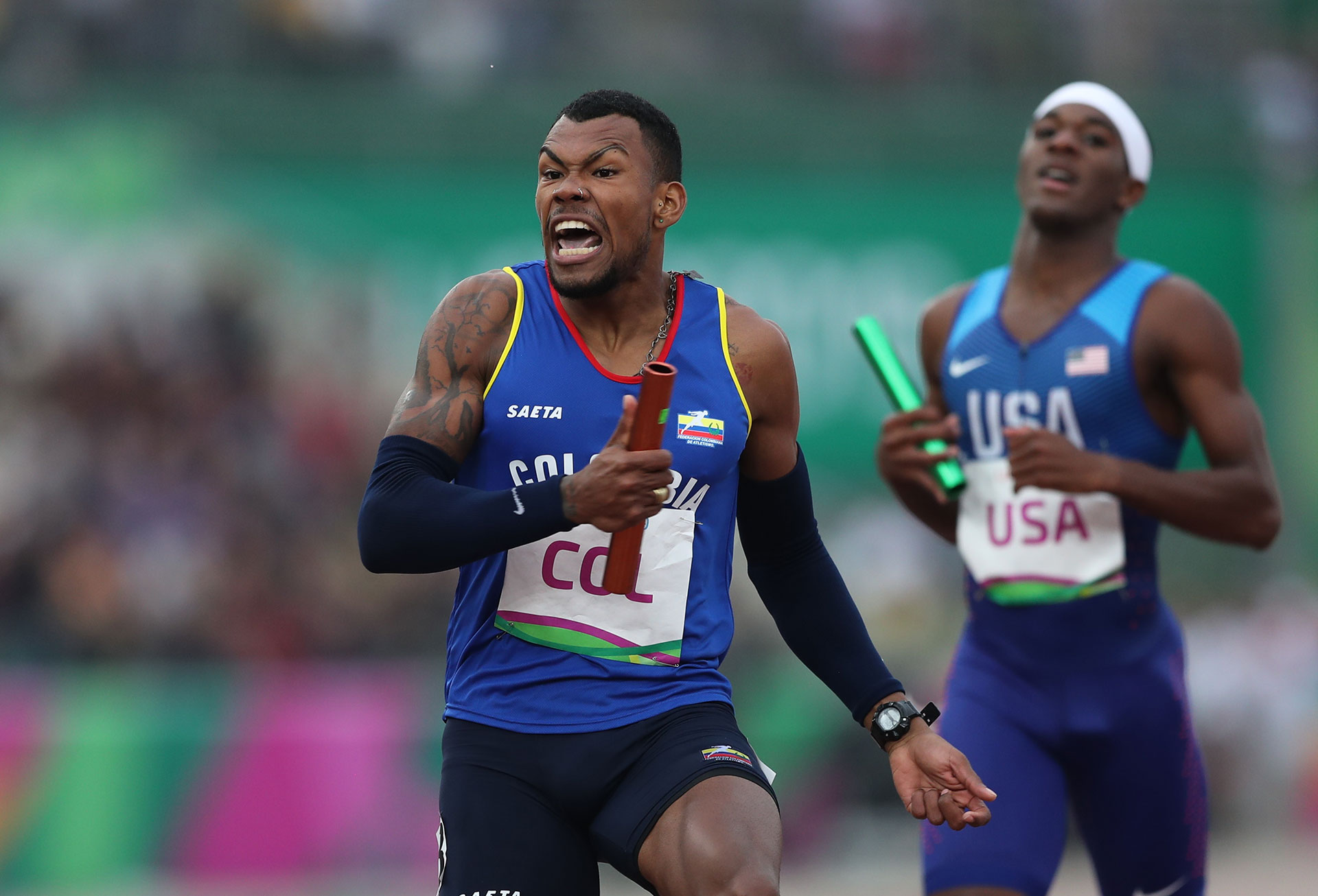 XVIII Pan American Games - Lima 2019 XVIII Pan American Games - Lima 2019 - Athletics - Men's 4x400m Relay Final - Athletics Stadium, Lima, Peru - August 10, 2019. Colombia's Anthony Zambrano celebrates the team's gold medal finish. REUTERS/Ivan Alvarado