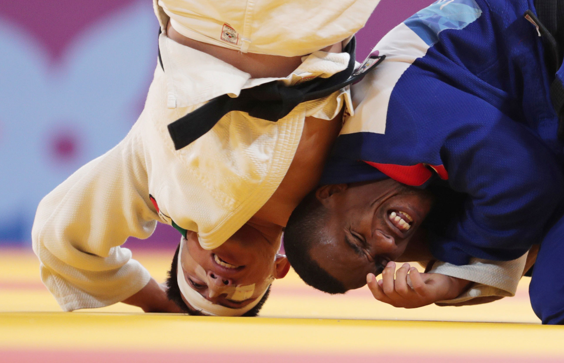 XVIII Pan American Games - Lima 2019 Judo XVIII Pan American Games - Lima 2019 - Men's 66kg Bronze - Villa Deportiva Nacional, Videna, Lima, Peru - August 9, 2019. Cuba's Osniel Solis and Mexico's Nabor Castillo in action. REUTERS/Guadalupe Pardo TPX IMAGES OF THE DAY