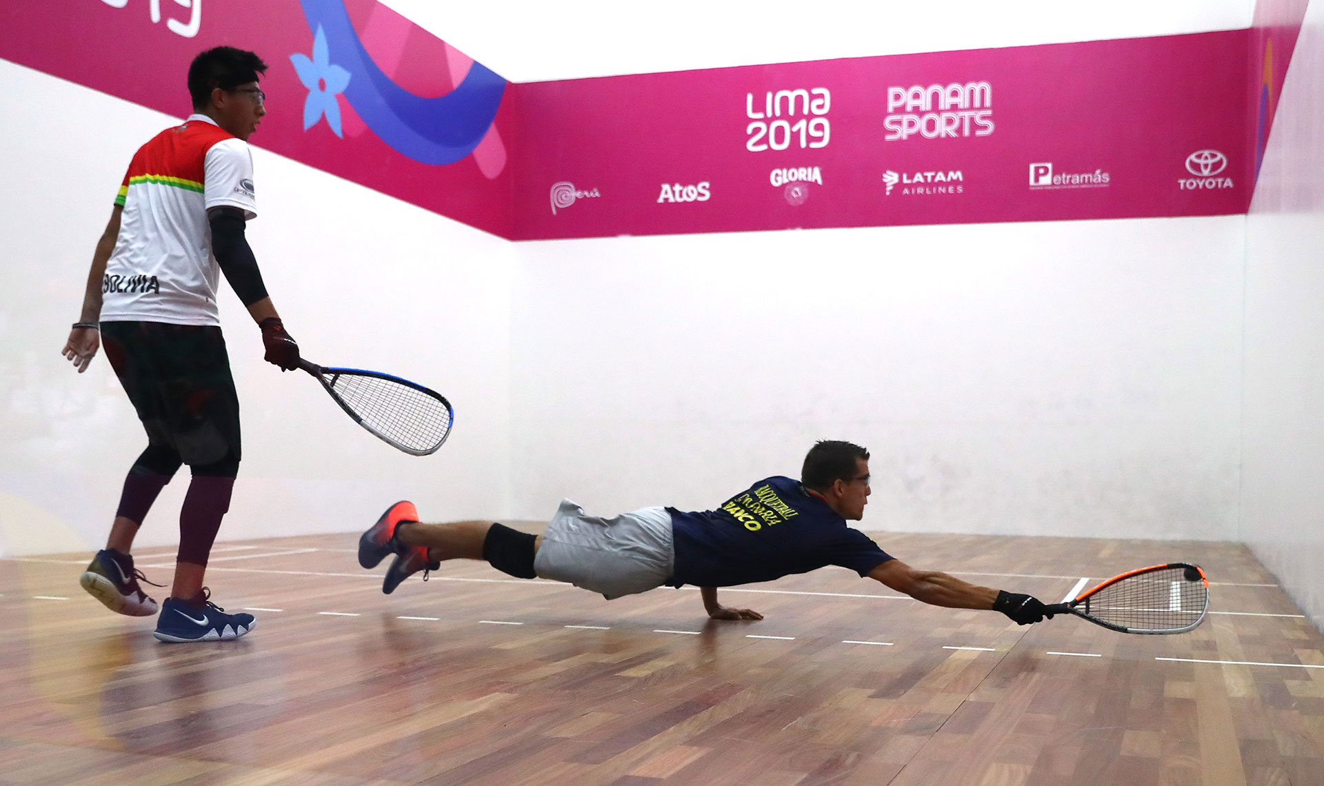 XVIII Pan American Games - Lima 2019 XVIII Pan American Games - Lima 2019 - Racquetball - Men's Team Gold Medal - Racquetball Courts, Lima, Peru - August 10, 2019. Colombia's Sebastian Franco and Bolivia's Carlos Keller in action. REUTERS/Pilar Olivares