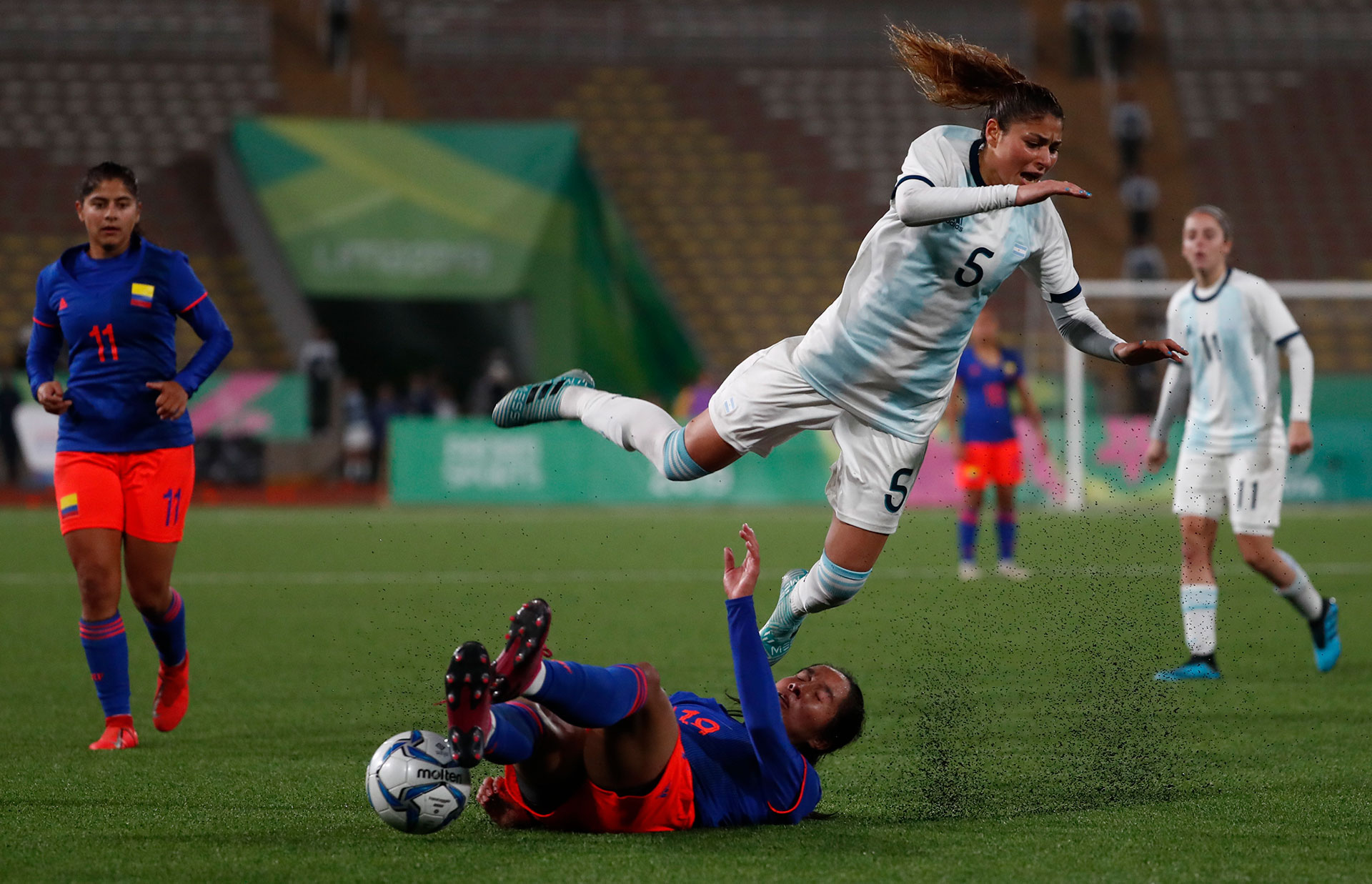 XVIII Pan American Games - Lima 2019 Soccer Football - XVIII Pan American Games - Lima 2019 - Women's Finals - Argentina vs Colombia - San Marcos Stadium, Lima, Peru - August 9, 2019. Argentina's Vanesa Santana and Colombia's Mayra Tatiana Ramirez Ramirez in action. REUTERS/Susana Vera