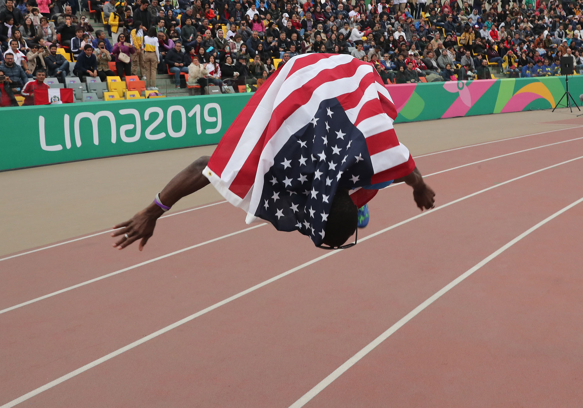 XVIII Pan American Games - Lima 2019 XVIII Pan American Games - Lima 2019 - Athletics - Men's Triple Jump Final - Athletics Stadium, Lima, Peru - August 10, 2019. Omar Craddock of the U.S. celebrates winning the gold medal in the event. REUTERS/Henry Romero
